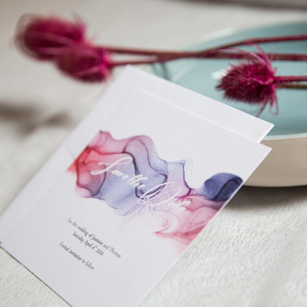Alcohol ink watercolour save the date card for a bright wedding style.