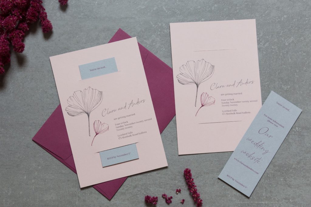 The most unique wedding invitations with pink ginkgo leaf design and plum envelope