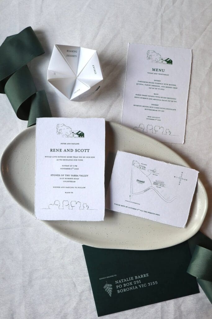 Stones of the Yarra Valley wedding invitations with a dark green and white colour palette.